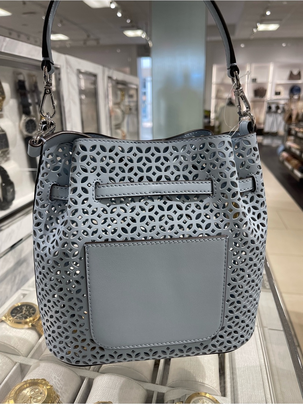 Michael Kors Carson Small Floral Laser Cut Bucket Crossbody Bag - Picture 13 of 14